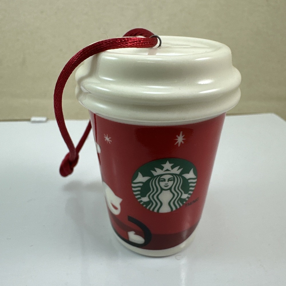Starbucks Holiday Ceramic Christmas Ornament-Boy w/ Dog Sledding Coffee Cup 2011
